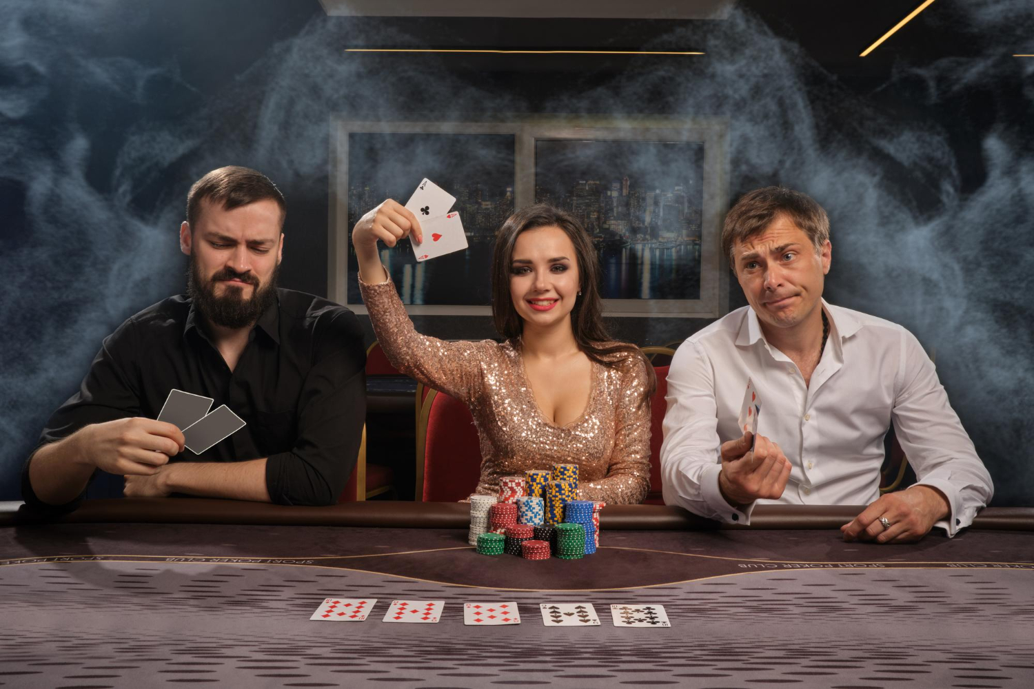 cheerful-friends-are-playing-poker-casino-smoke-girl-has-won-showing-her-cards-men-had-lost-youth-are-making-bets-waiting-huge-win-gambling-money-games-fortune